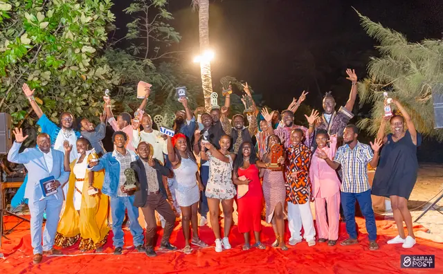 Festival filmmakers celebrating together with their awards