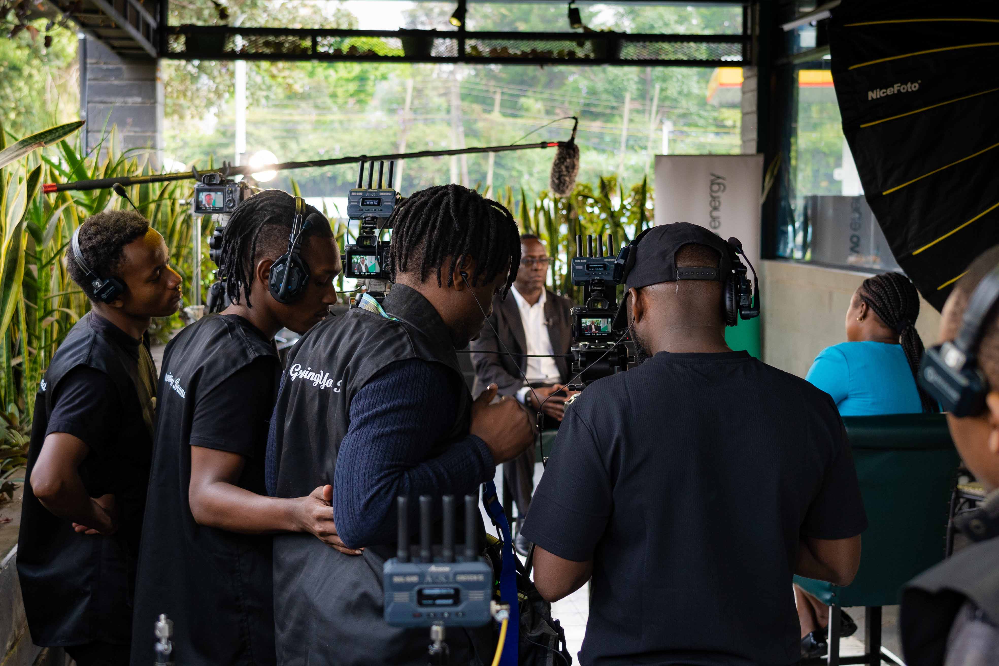 Mic-Jasiri crew operating a multi-camera interview set